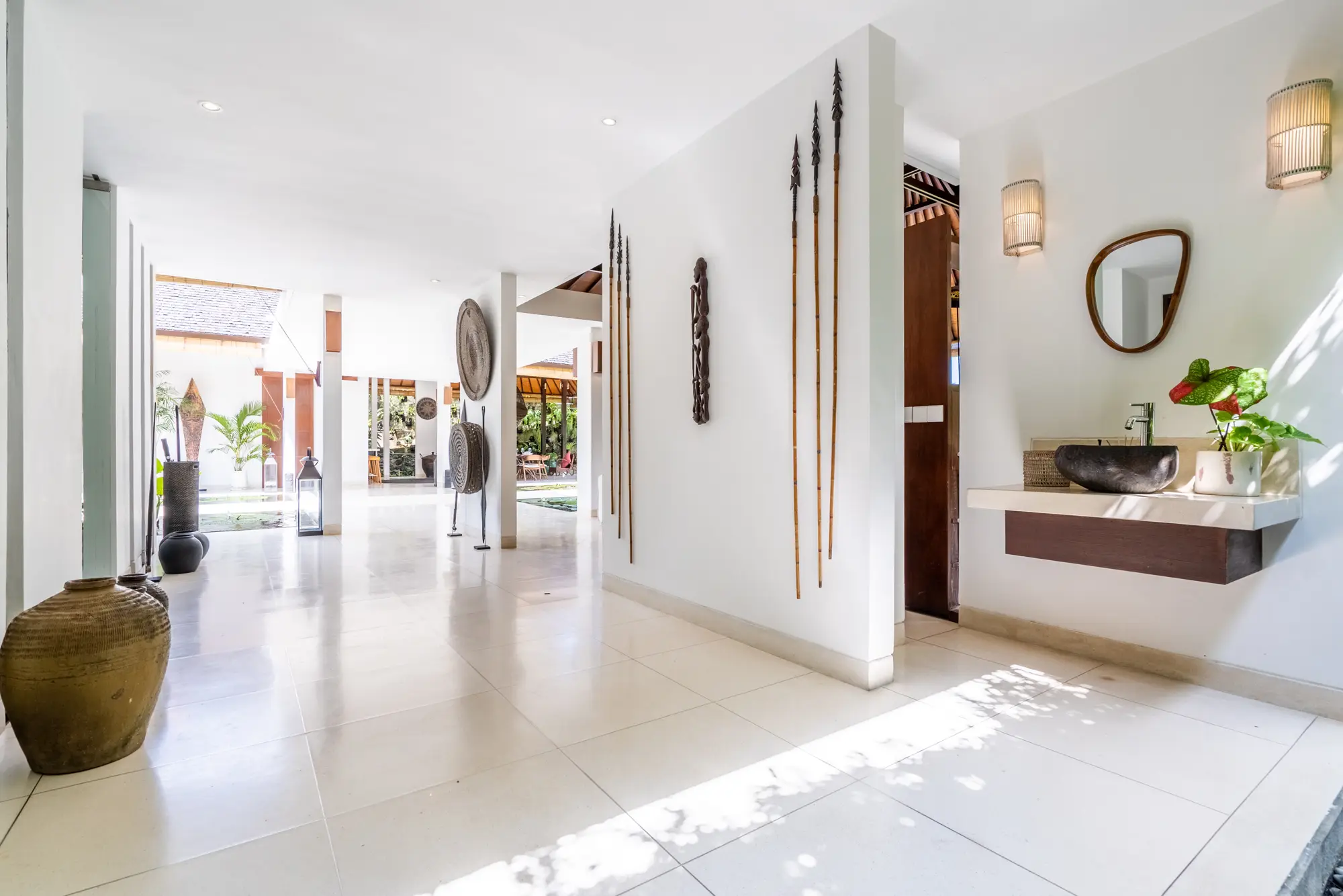 A bright corridor through the villa