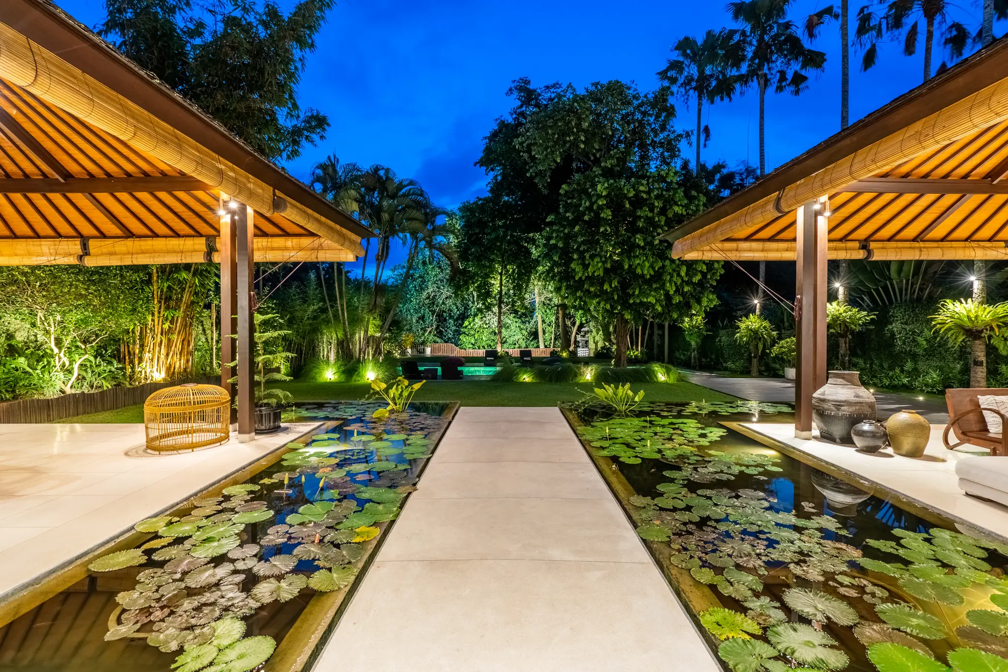 The lotus walkway and pavilion lit at night