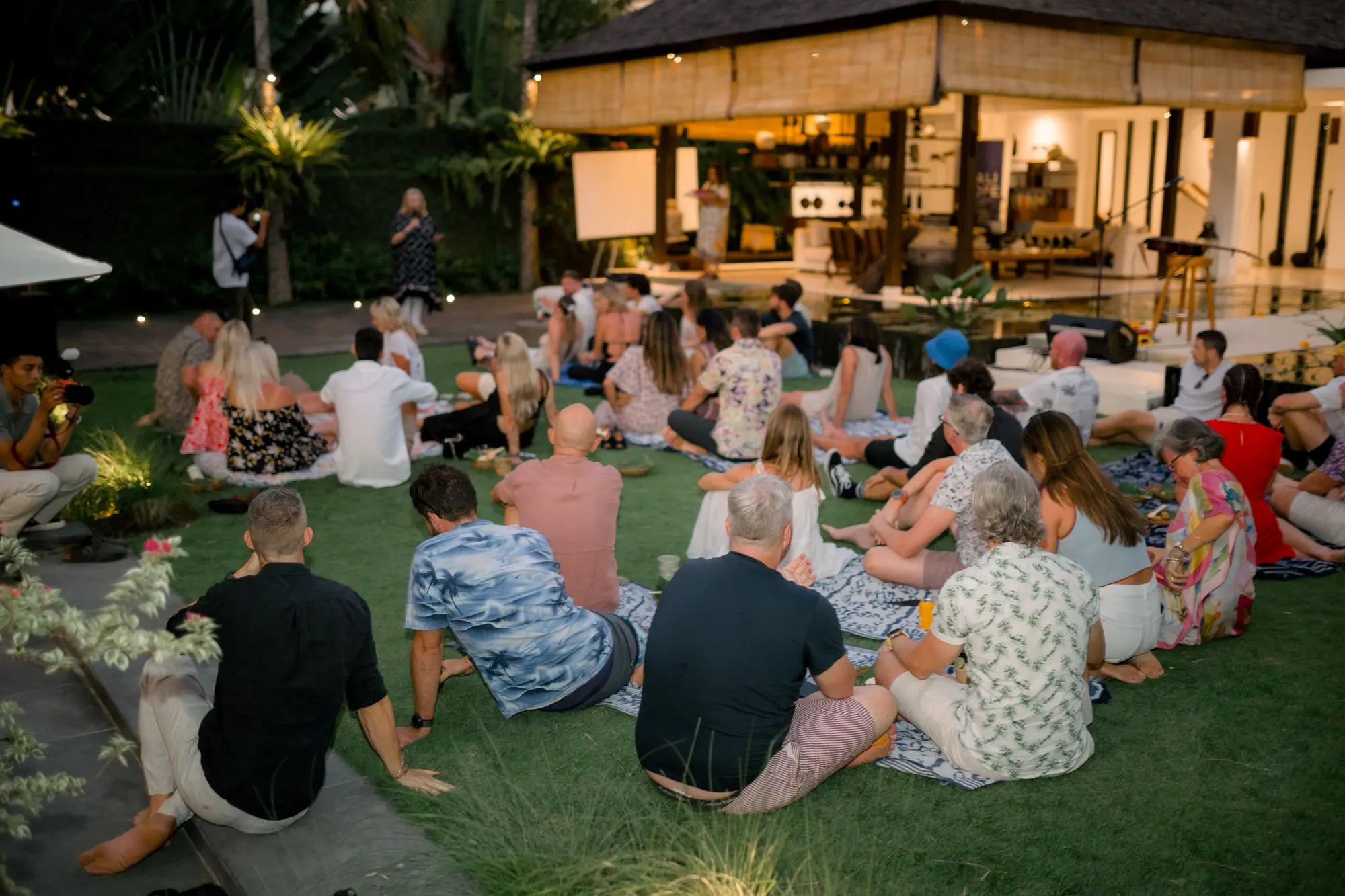 A large group gathered on the lawn