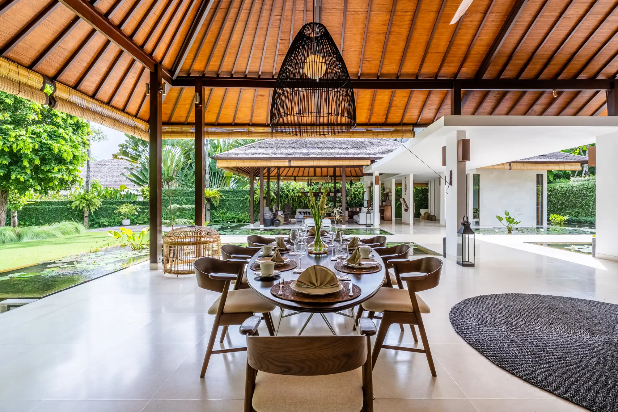 The dining table under a timber roof