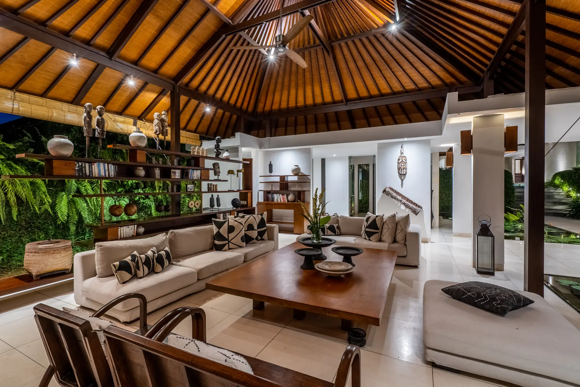 The living room with sofas and bookshelves