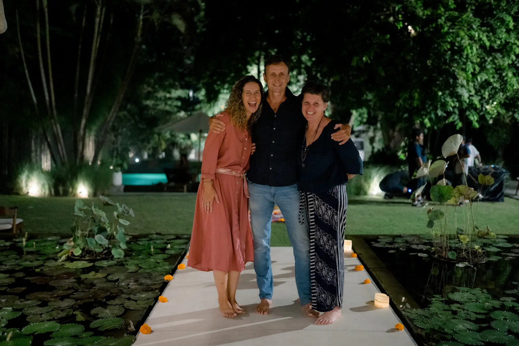 Guests by the lotus pond in the evening