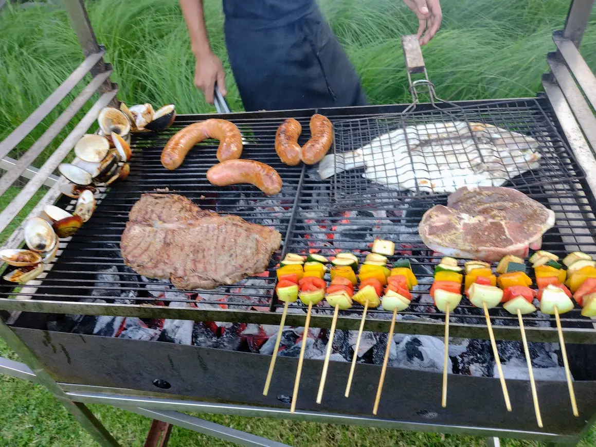 Steaks, sausages and skewers on the barbecue