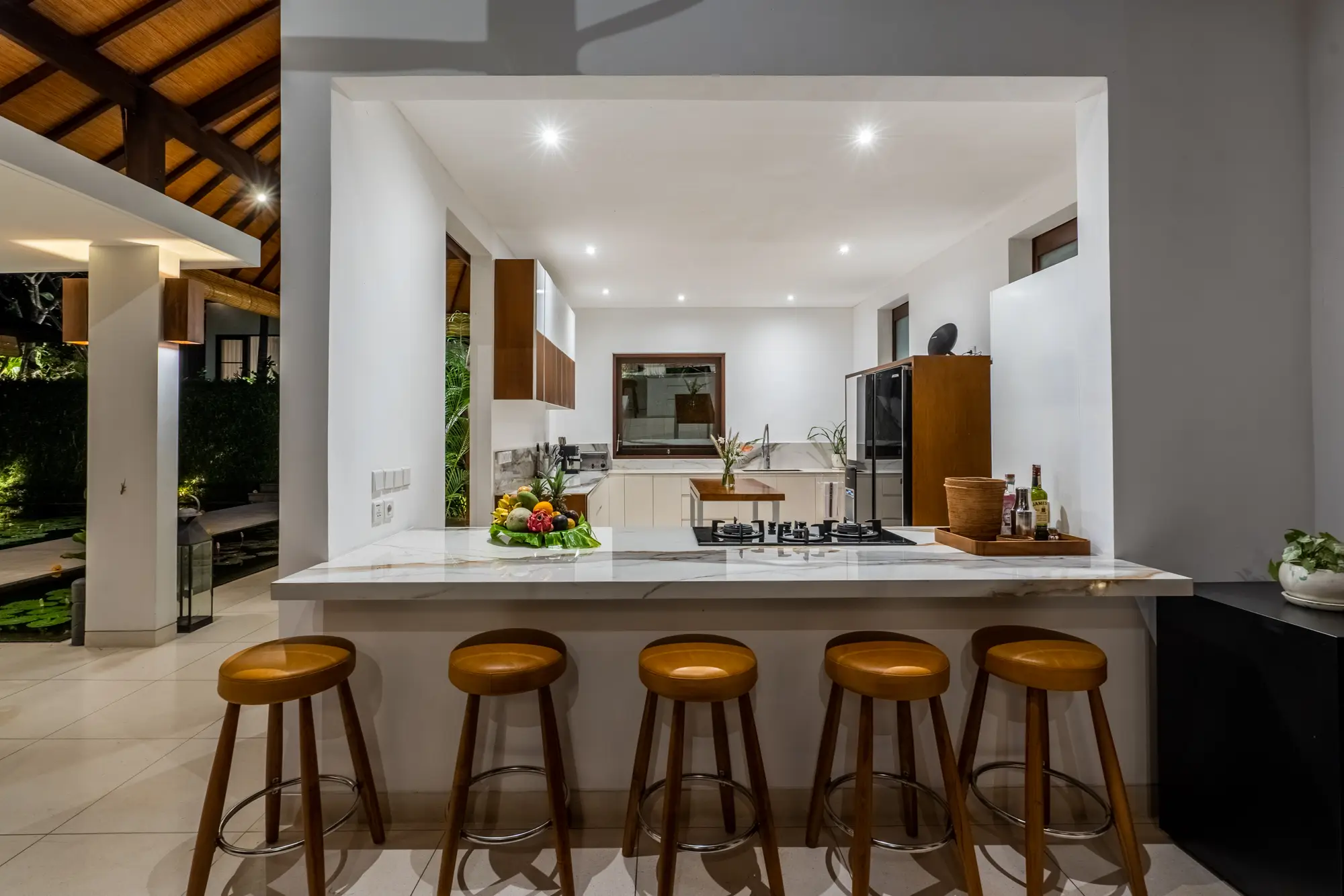 The kitchen and breakfast bar seen from the dining area