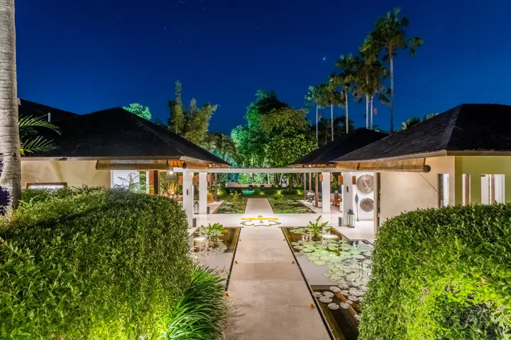 A garden path lit at dusk