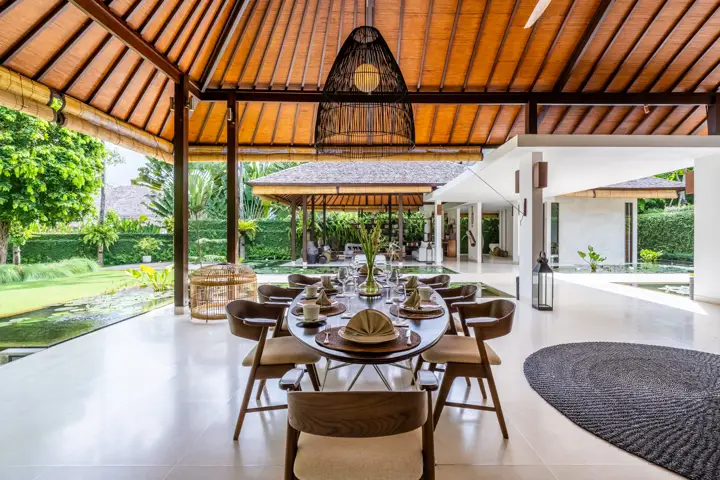 The dining table under a timber roof