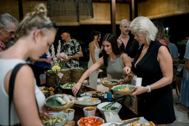 Guests serving themselves from a buffet