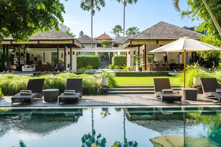 The pool and lotus pond with loungers