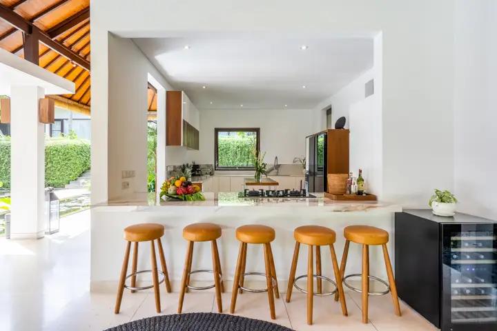 The kitchen with a breakfast bar