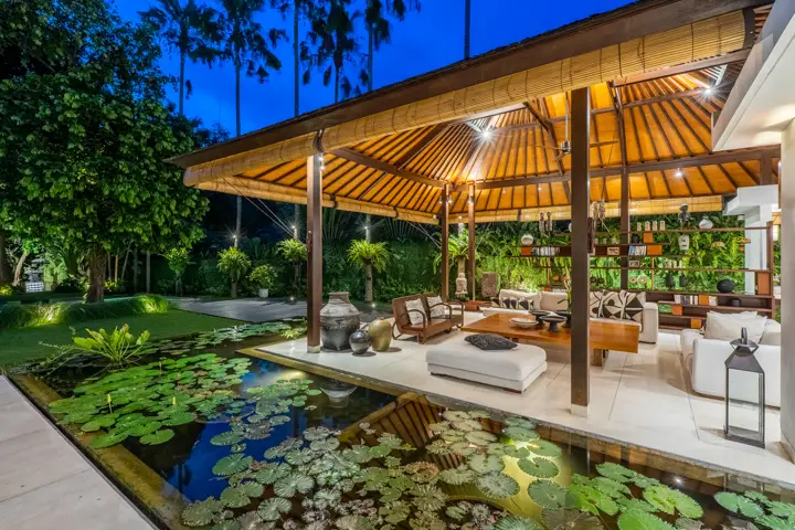 A pavilion beside the lotus pond at dusk