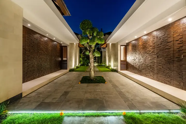 The entrance courtyard lit at night